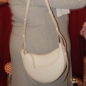 Polene Cream Crescent Crossbody Bag with Leather Trim